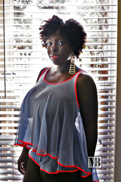 lovethemblacktitties:  melvinblair:showkase10:  Sexy  She’s a beautiful chocolate woman  Nice rack