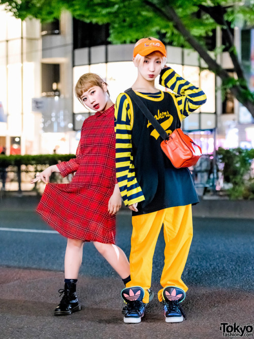 tokyo-fashion:  Always fun Karin and P-Chan from the Japanese dance group Tempura Kidz on the street in Harajuku at night wearing colorful looks with items from FUBU x Versace (Freak City), Lakers, Dr. Martens, Adidas, and SAS. Full Looks