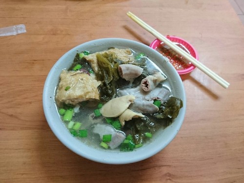 Pig aorta and intestines with greens, soybean skin, and chives…....