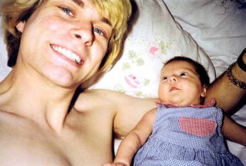 Kurt Cobain with his daughter (1992)