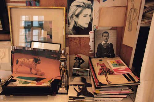 julia-loves-bette-davis:Yves Saint Laurent’s personal pictures on a shelf of his Parisian studio. A 