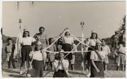 Girls use ribbons to make a Star of David in a Zionist pageant in the Deggendorf displaced persons&r