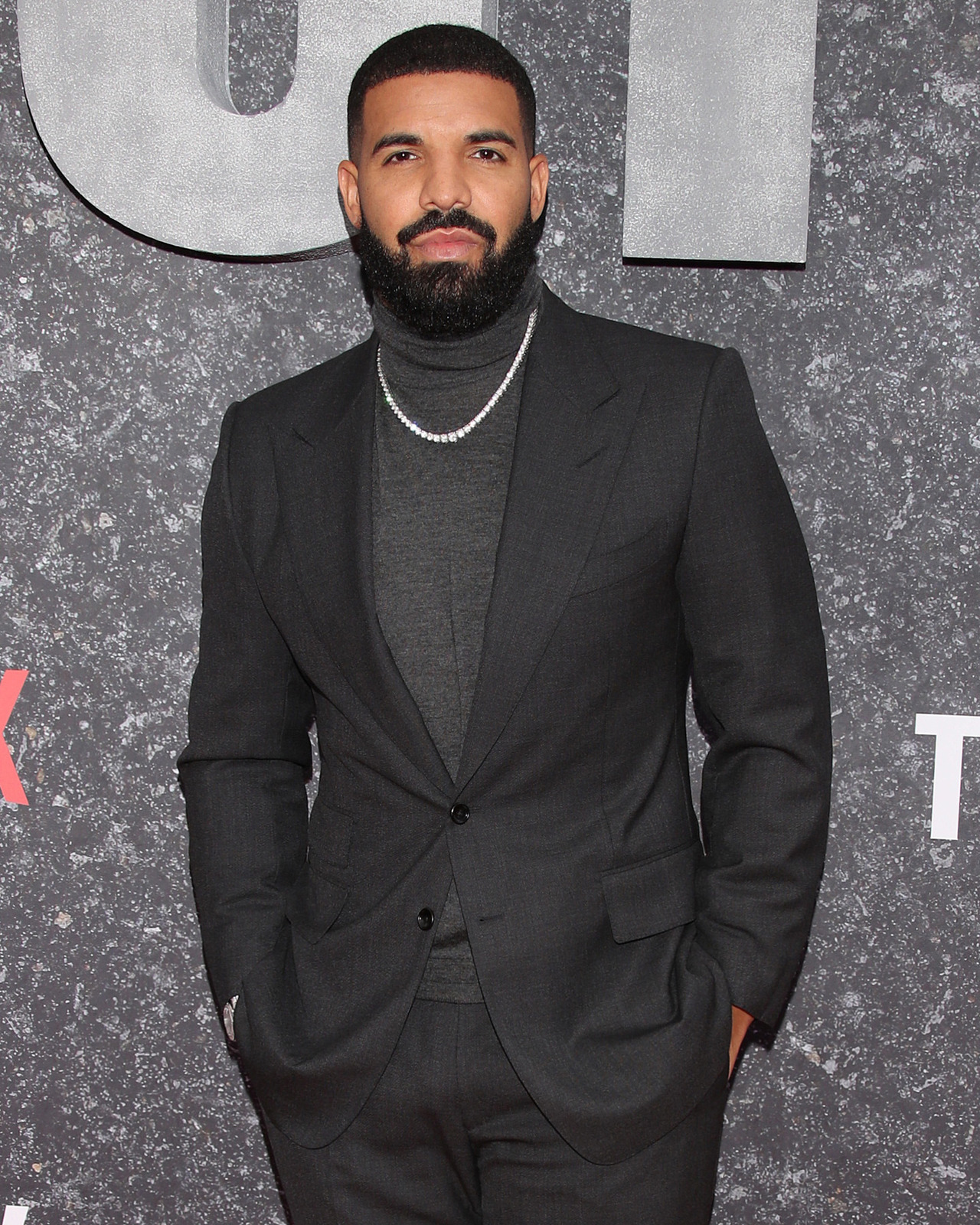 TOM FORD - Drake wore a charcoal grey TOM FORD Shelton suit...