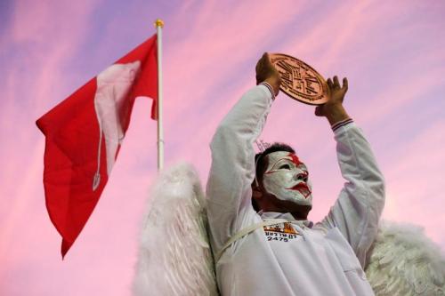 A protester attends a rally to call for the ouster of Prime Minister Prayuth Chan-ocha&rsquo;s g