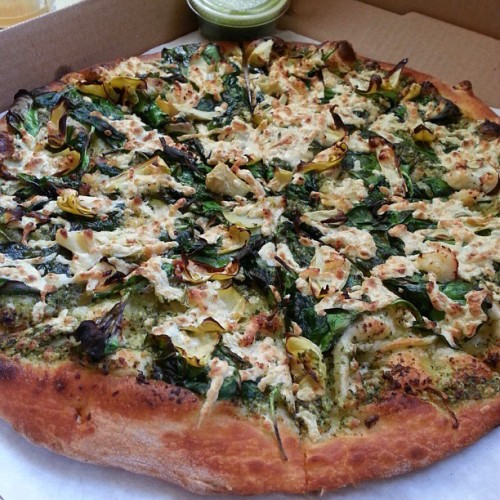 veganpizzafuckyeah:  reblogged from christianvegan:  Post workout cheat meal insanity. Thin crust “Gourmet Pesto” pizza from Cruzer Pizza with extra pesto. Sooo effing full :p #vegan #vegansofig #cruzer #cruzerpizza #daiya  