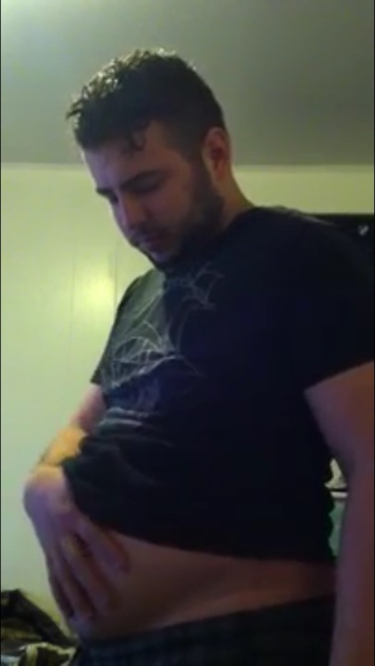 fatguyworld:  Admiring how fat he’s getting 