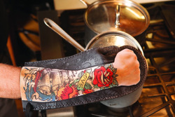 dailycoolgadgets:  Tattoo Oven Mitt For those who’ve fantasized the look of a tattooed hand but are reluctant to take up this permanent makeover can enjoy the experience temporarily using the Tattoo Oven Mitt by DCI.