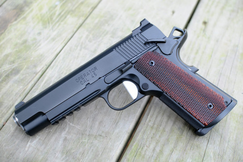 gunsknivesgear:  I am not a fan of the 1911 pistol.  I think it is outdated, a reproduction antique.  But it is still a goddamn beautiful pistol.  Shooting it gives me a thrill no plastic wonder-gun can duplicate.  That low boom of those hot and heavy