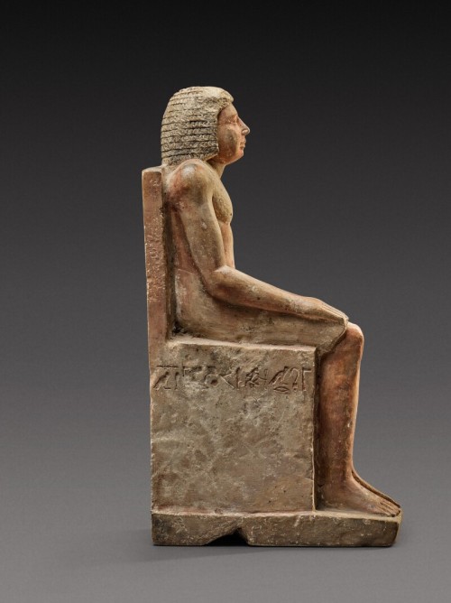 An Egyptian Polychrome Limestone Figure of Hem-Min6th Dynasty, 2360-2195 B.C.Inscribed &ldquo;Tr