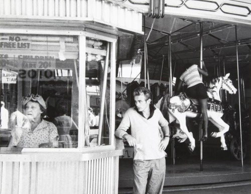 losetheboyfriend:  James Dean at the Santa Monica Pier carousel; captured by Sanford Roth (1955)
