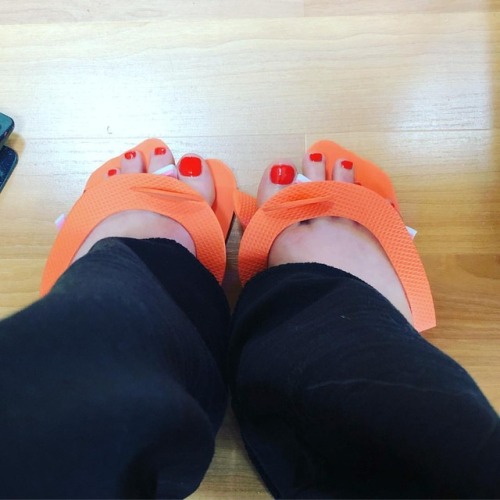 Loving this new pedi! More pics to come soon! #newpedi #redtoes #orangetoes #michiganfeet #detroitfe