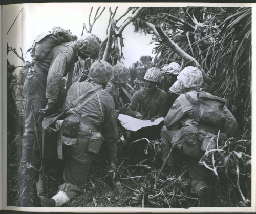 &ldquo;Photograph of Marines Having a Briefing on Iwo Jima,&rdquo; 2/20/1945 File Unit: