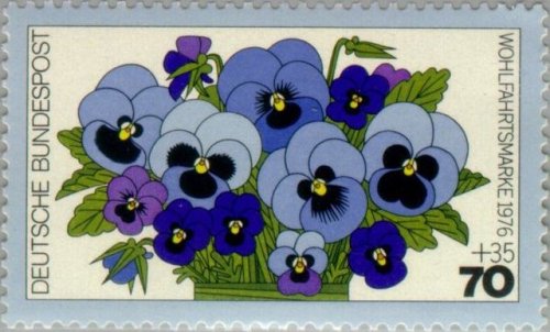 stamp-it-to-me:a 1976 German stamp depicting violets from a series on garden flowers