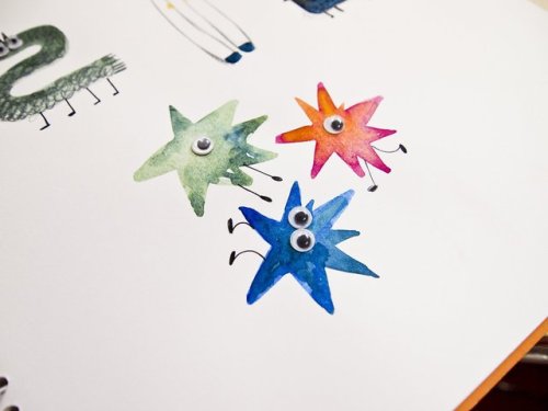 gamnamu:  I put my toy eyes on top of the watercolor doodles.