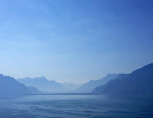 A stunning view from a balcony at the beautiful Lake Geneva, early in the morning around 8, august 2