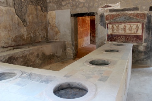 worldhistoryfacts: A thermopolium in Pompeii. These were the Roman equivalent of fast food restauran