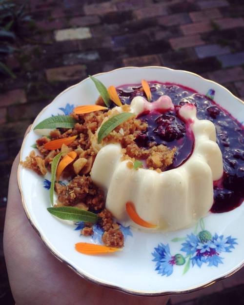 lemon verbena infused panna cotta with macadamia crumb and blackberry/lime compote to cut through th
