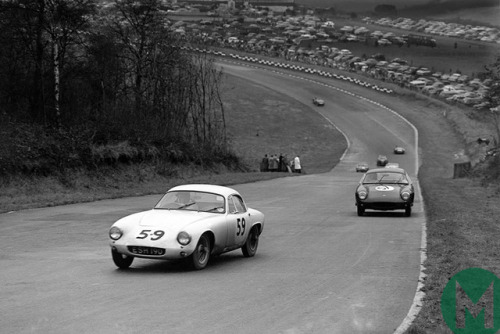 Jim Clark leading Colin Chapman, both Lotus Elite:s, during the GT race National Brands Hatch on Box