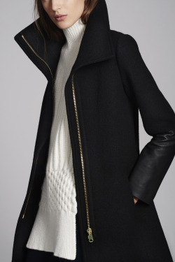 clubmonaco:  Speak volumes in a leather-trimmed coat with enveloping collar. 