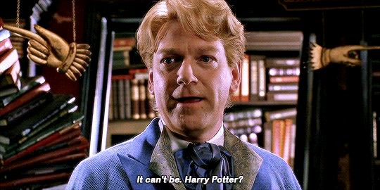 Professor Lupins — “Ladies and gentlemen, Mr. Gilderoy Lockhart.”...