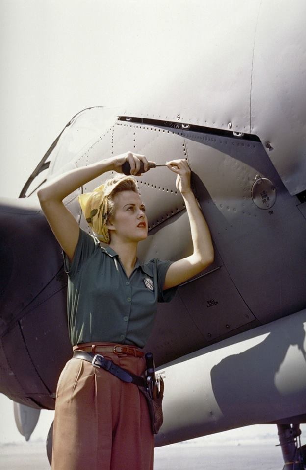 general-taylor:A Lockheed employee works on a P-38 Lightning, Burbank, CA, 1944.
