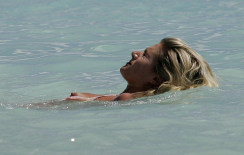 toplessbeachcelebs:  Sarah Jayne Dunn (British Actress) bikini slip in Barbados (December 2004)