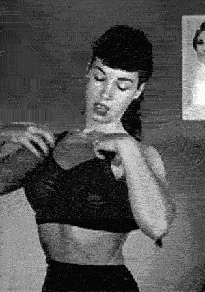 dissociative-anesthesia:  Bettie Page   Lovely to see Betty Paige. The grainy B&amp;W