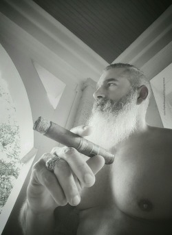 doyouevenbeardtho:  Graycliff in grayscale.  Self-portrait www.daviddudarphotography.com All rights reserved.   View more portraits and book a shoot at www.manshotsbydave.tumblr.com   #B&amp;W #beard #cigar #smoke #shirtless #pecs