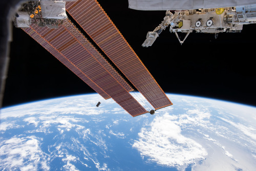 Miniature “Cubesat” satellites being launched from the International Space Station.Photo