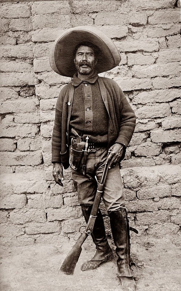 Mexican bandito, late 19th or early 20th century. – @peashooter85 on Tumblr