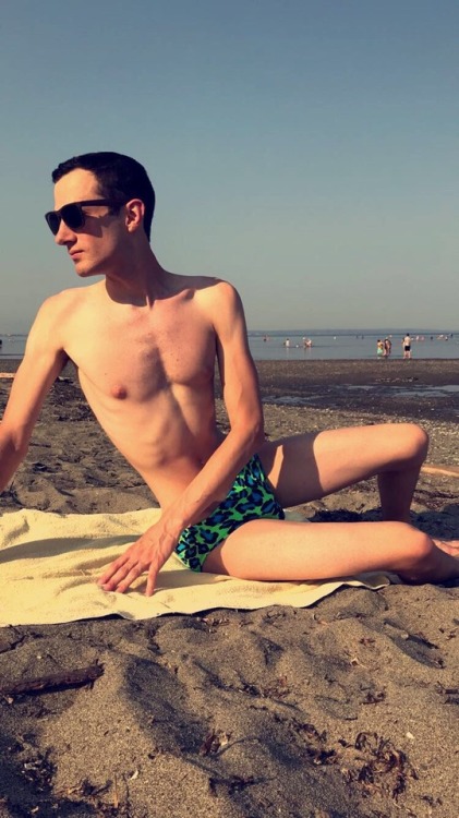 thelockedcanadian: Day 16! Nervous boy at the crowded beach attempting to hide my cage in a speedo [
