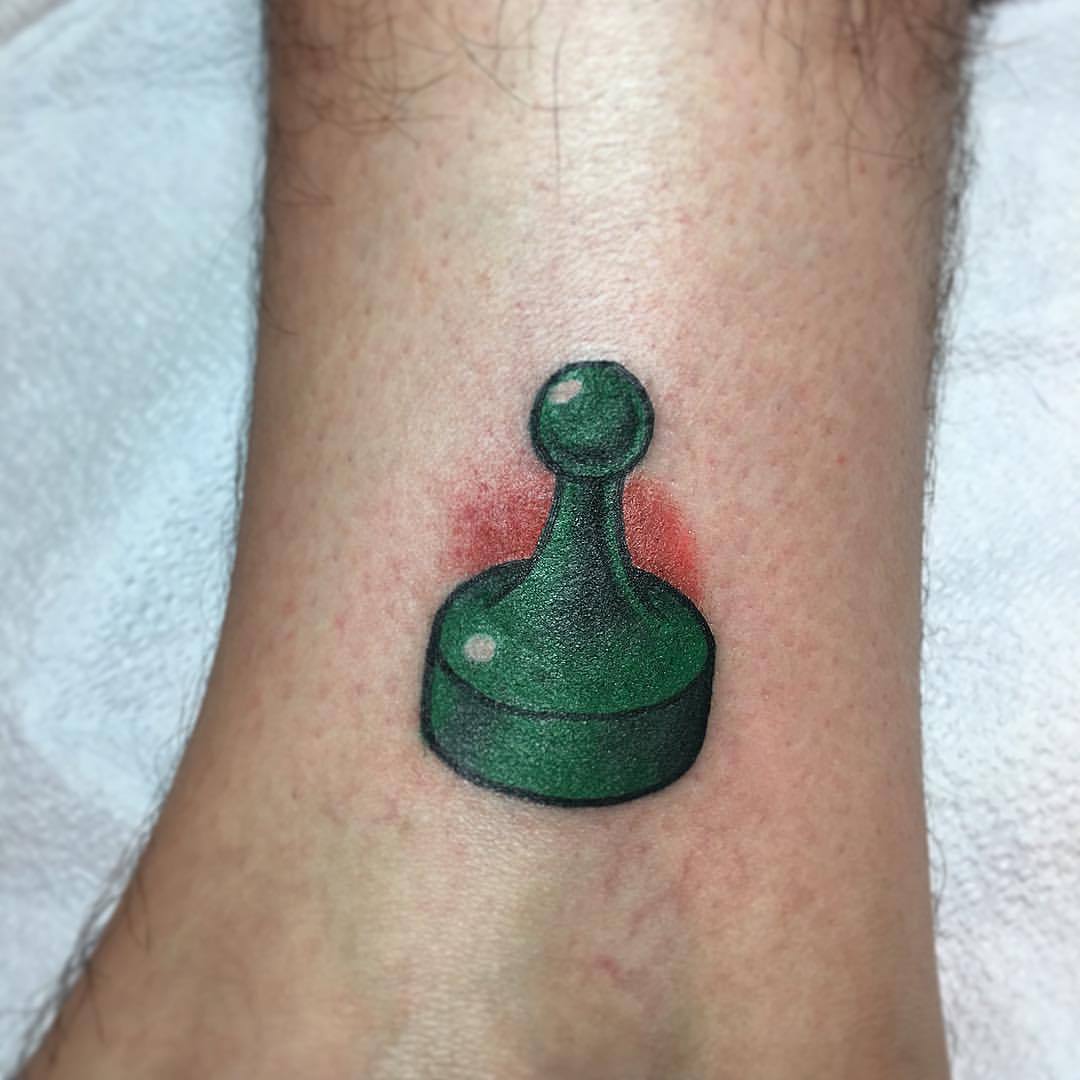 A board game meeple by Austin at Rockin Ink Tattoo in Las Vegas  rtattoos