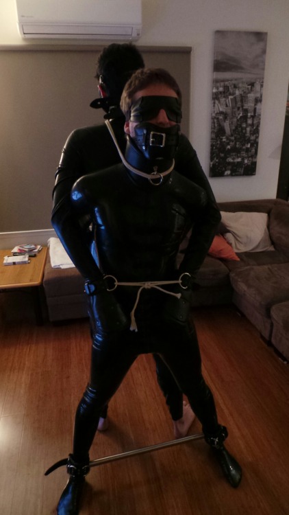 pandasandpaddles:  Rubber time while gagged, blind folded, spreader bar and tied to another guy wear