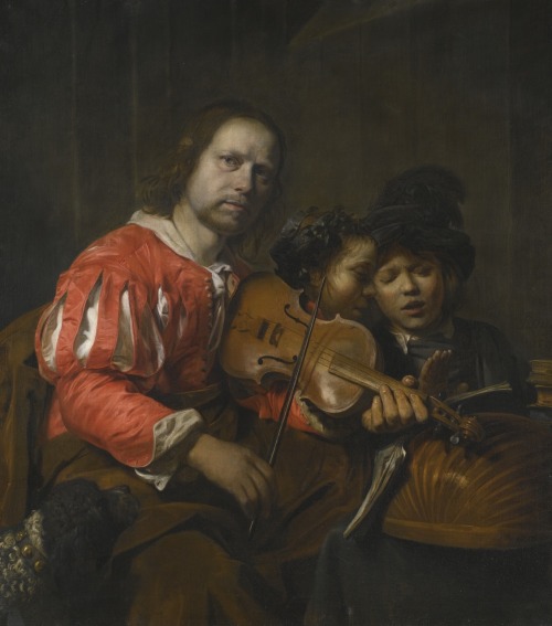 A violin player accompanying two young singers.1658.Oil on Canvas.111.8 x 99.1 cm.Art by Jan de Bray