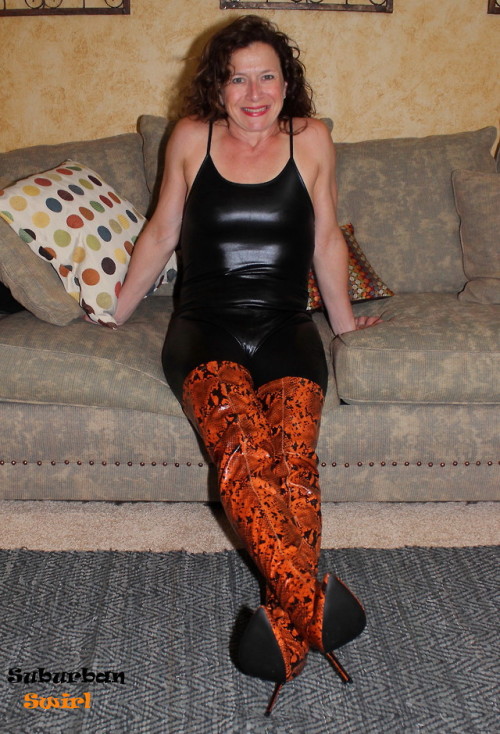 suburbanswirl:  Spaghetti strap lycra catsuit by Go Jane and faux orange snakeskin thigh boots by Na