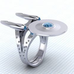 hermajestyqueenofrandom:  What a beautiful, custom-made ring. This is the USS Enterprise, as a ring.  I’d totally buy it.  
