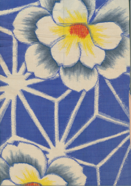 A meisen silk kimono with bold flowers and geometric patternwork. Horizontal metal-insert highlights
