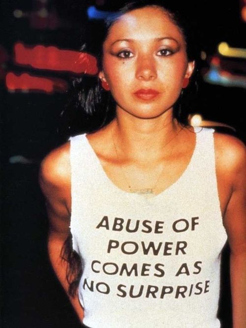 twixnmix: Graffiti artist Lady Pink photographed by Lisa Kahane wearing a Jenny Holzer  “