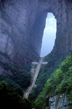 conflictingheart:The following is Tianmen Mountainn also known as Heaven’s Gate Mountain located in northwestern Hunan Province, China.