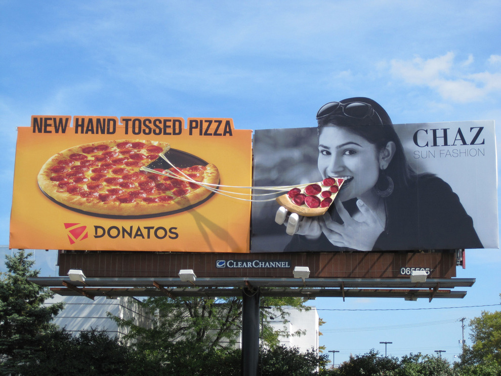 buzzfeed:  Some billboards get a lot more creative than others.  
