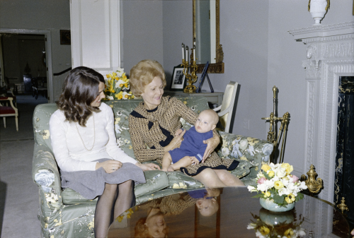 First Lady Pat Nixon holding Justin Trudeau, the son of Canadian Prime Minister Pierre Trudeau, and 