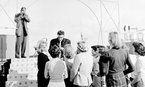 vinceveretts:  Elvis Presley with fans on the deck of the USS Hancock aircraft carrier, San Diego, April 3, 1956. 