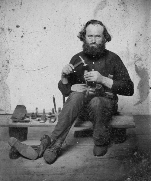 chubachus:Tintype portrait of a cobbler posing with his tools and shoes, c. 1800′s.Source: National 