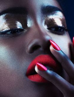 maybelline:  Glossy, metallic lids and neon lips.