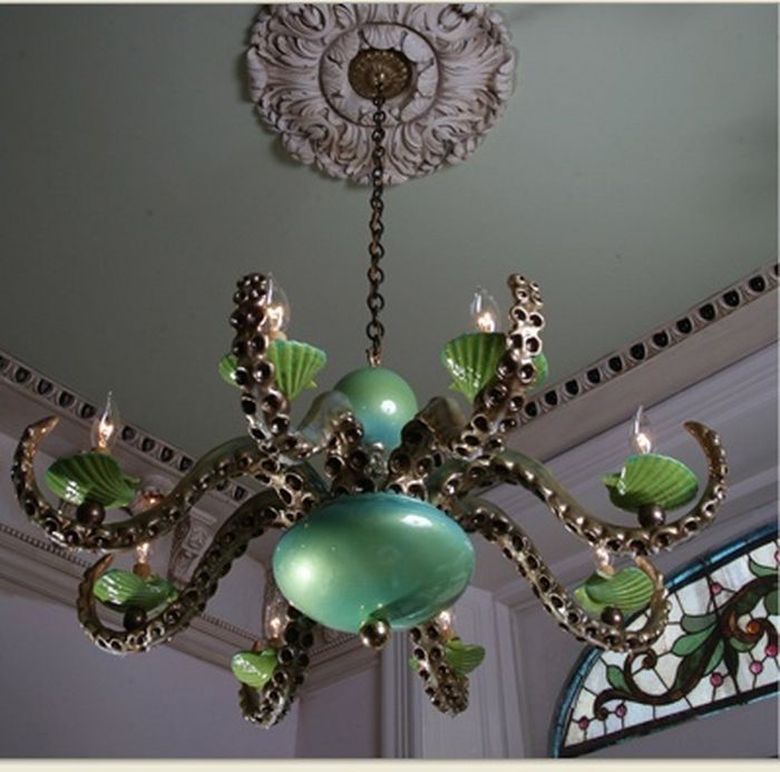 little-bunnys-creepies:  Octopus inspired chandeliers.  A few were created by the
