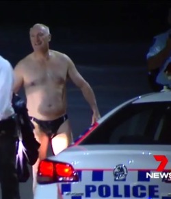 realundiemen:  Policeman in wet undies…carrying