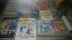 Because of all the stuff going on in my life right now, I sadly wasn&rsquo;t able to go to Bronycon. But a friend of mine, Alexstrasza, gathered some swag for me and mailed it to me. &lt;3 The roll to the right is Smitty&rsquo;s cheerleader poster, sadly