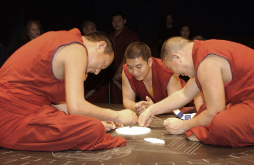 freersackler:  In response to the September 11 tragedies, twenty Buddhist monks from the Drepung Loseling Monastery constructed a sand mandala (sacred painting) at the Sackler in 2002. This seven-foot-square mandala, one of the largest ever created in