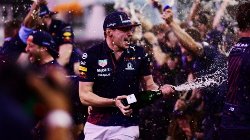 2021 F1 World Drivers Champion Max Verstappen Celebrates With His Team After The F1 Grand Prix Of Abu