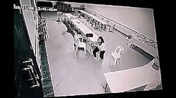 unexplained-events:  Poltergeist activity caught on a CCTV camera at a Malaysian hotel.The video shows a woman just sitting in what appears to be an empty dining hall when all of a sudden she is caught in strange poltergeist activity.SOURCE